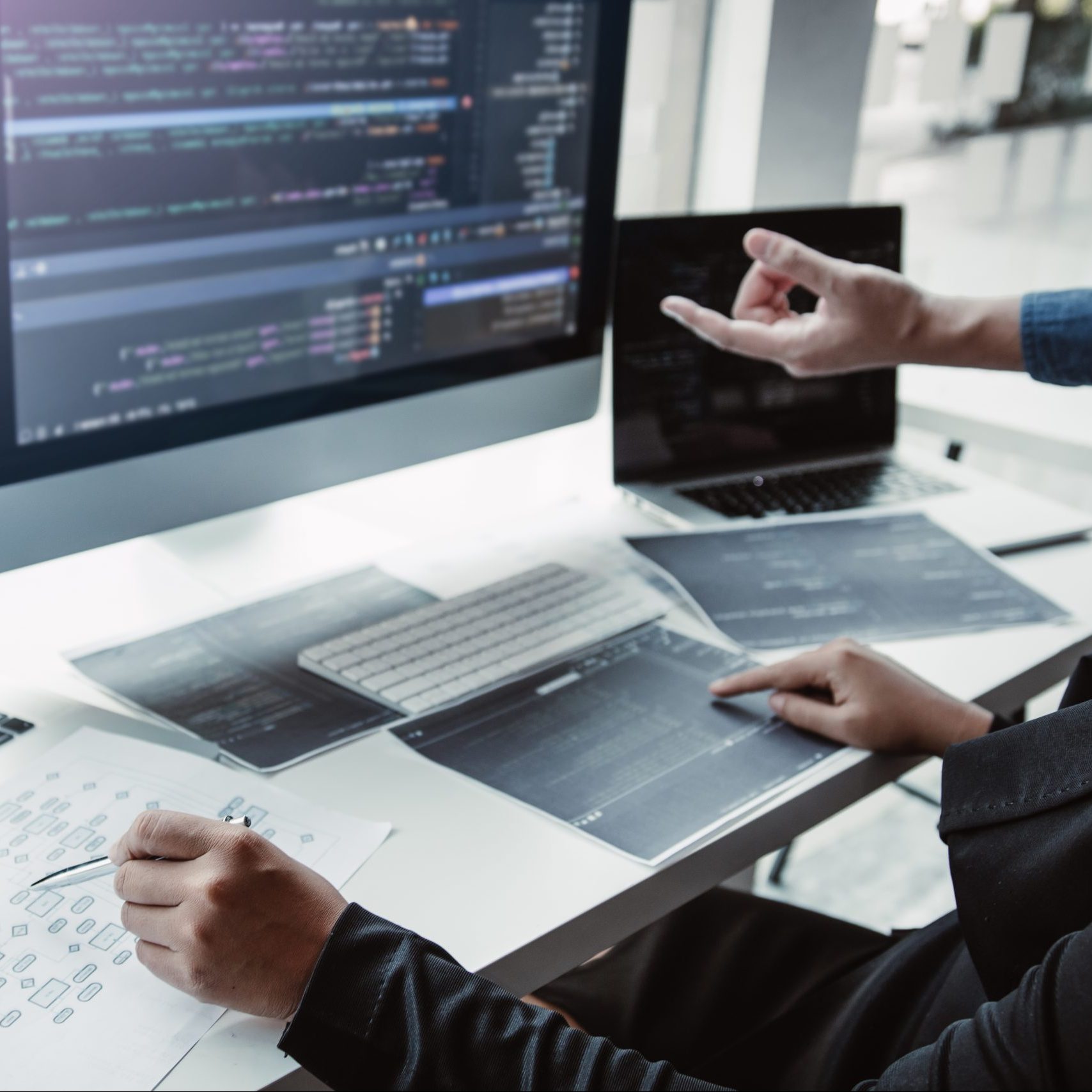 Two asian team working development of programming and encryption